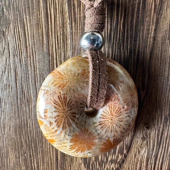 Light Yellow Coral Fossil Donut Pendant Necklace on Brown Faux Suede - Picture 6 of 11